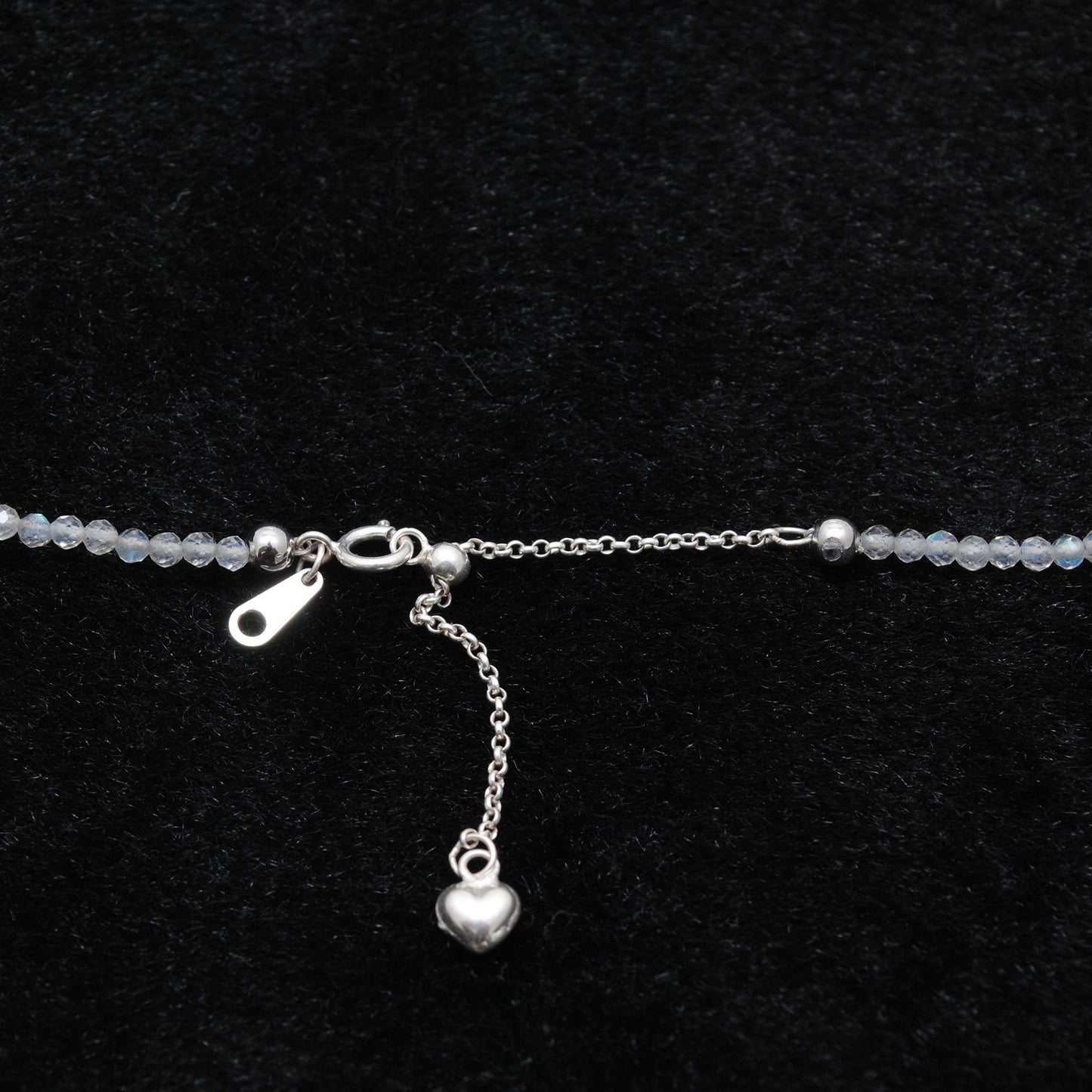 "Handmade labradorite beaded choker with sterling silver star charm, shimmering gemstone necklace with blue flash."