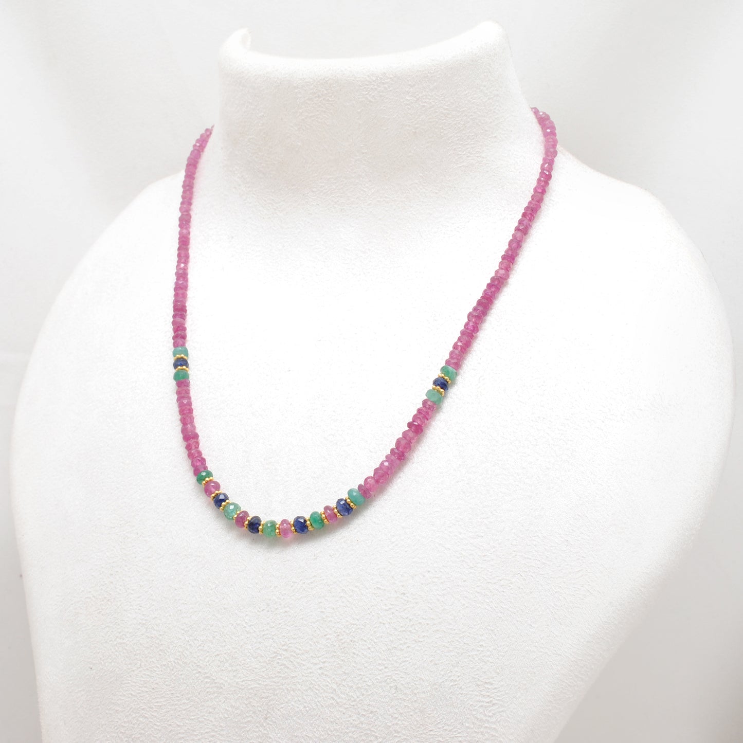 Ruby, emerald and sapphire beaded gold plated necklace with multicolor gemstones and elegant design