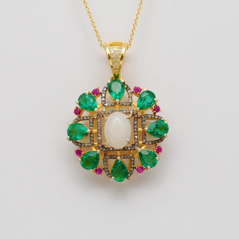 Sterling silver pendant adorned with pave-set diamonds and assorted multi-colored gemstones in a sophisticated and eye-catching design