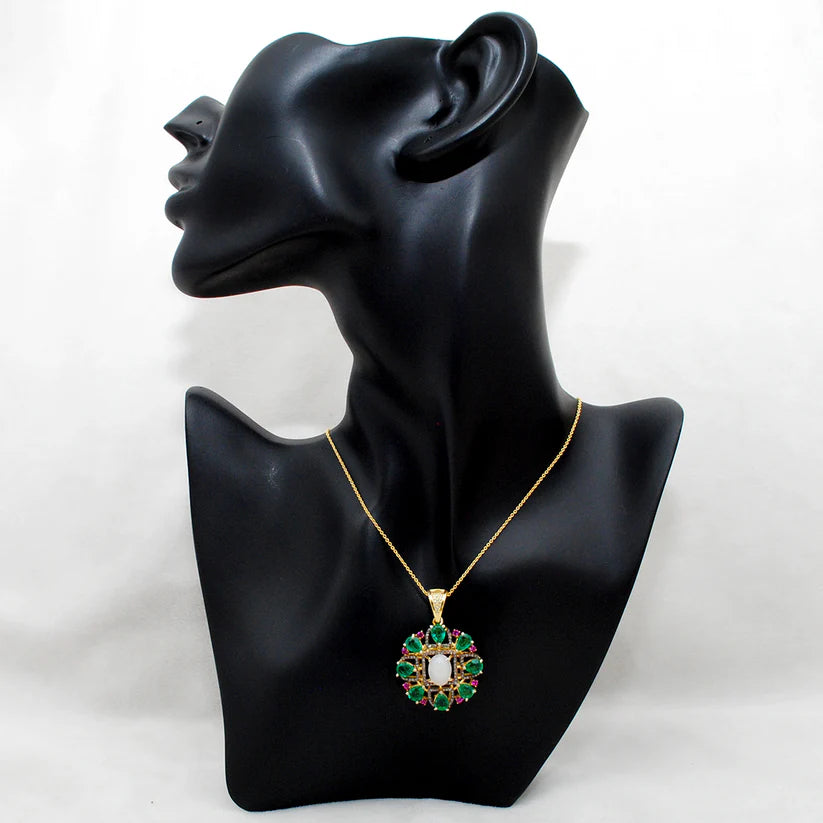 Sterling silver pendant adorned with pave-set diamonds and assorted multi-colored gemstones in a sophisticated and eye-catching design