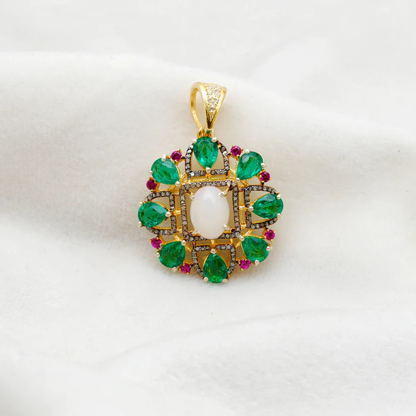 Sterling silver pendant adorned with pave-set diamonds and assorted multi-colored gemstones in a sophisticated and eye-catching design