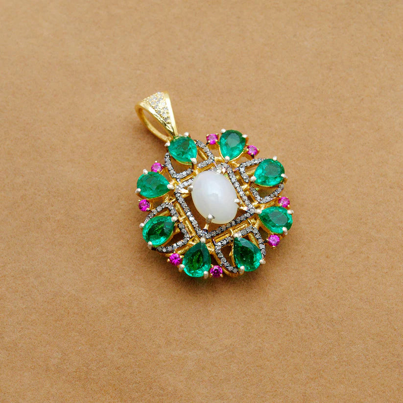 Sterling silver pendant adorned with pave-set diamonds and assorted multi-colored gemstones in a sophisticated and eye-catching design