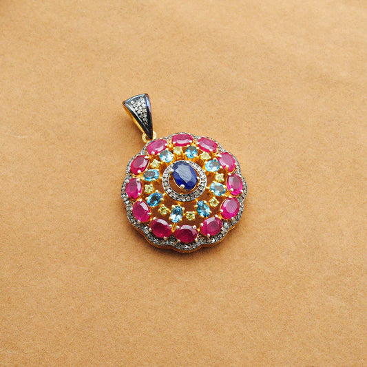 925 sterling silver pendant with pave-set diamonds, featuring vibrant ruby, blue topaz, sapphire, and peridot gemstones in an elegant design