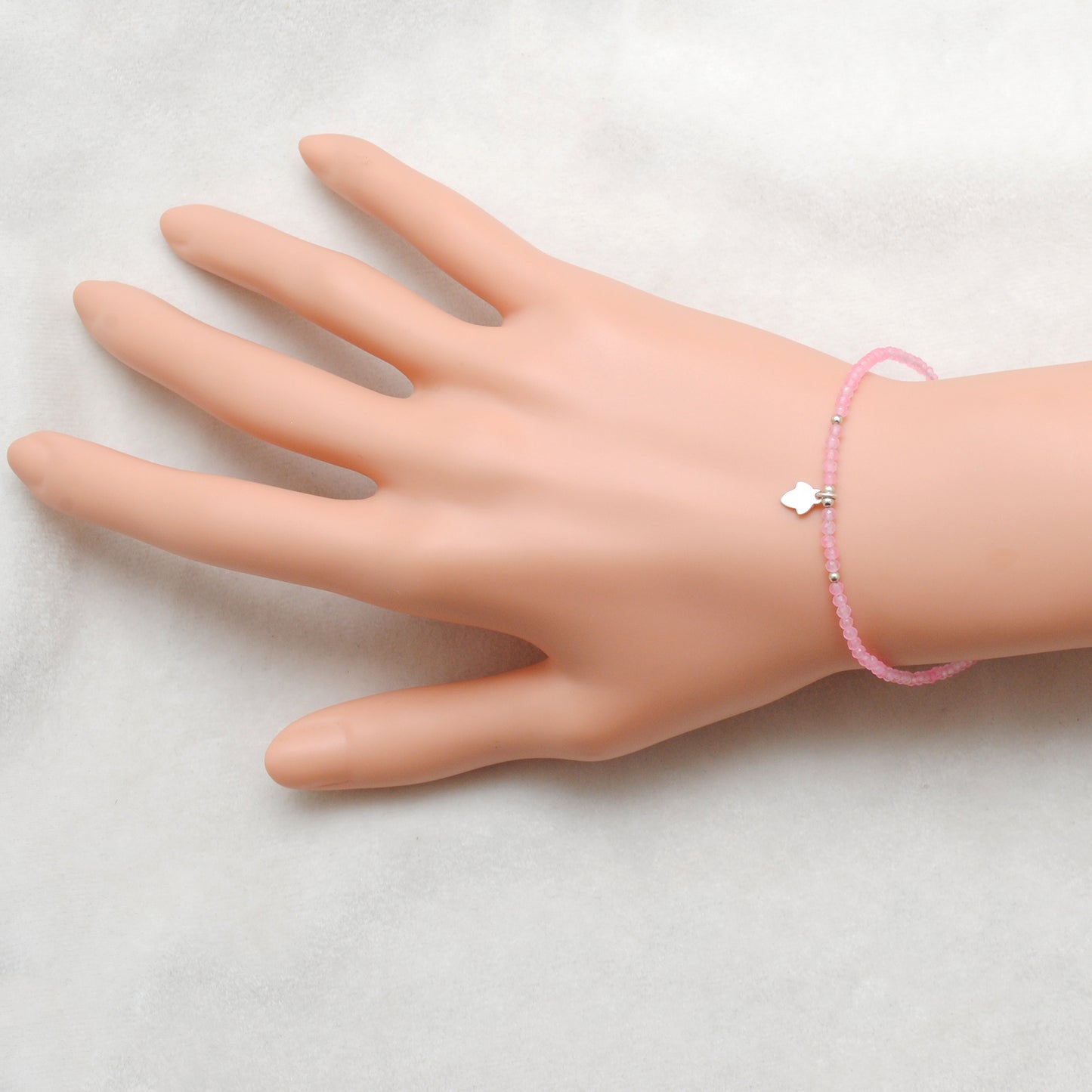 "Pink chalcedony gemstone bracelet with 925 sterling silver charm, handmade delicate beaded jewelry for women."