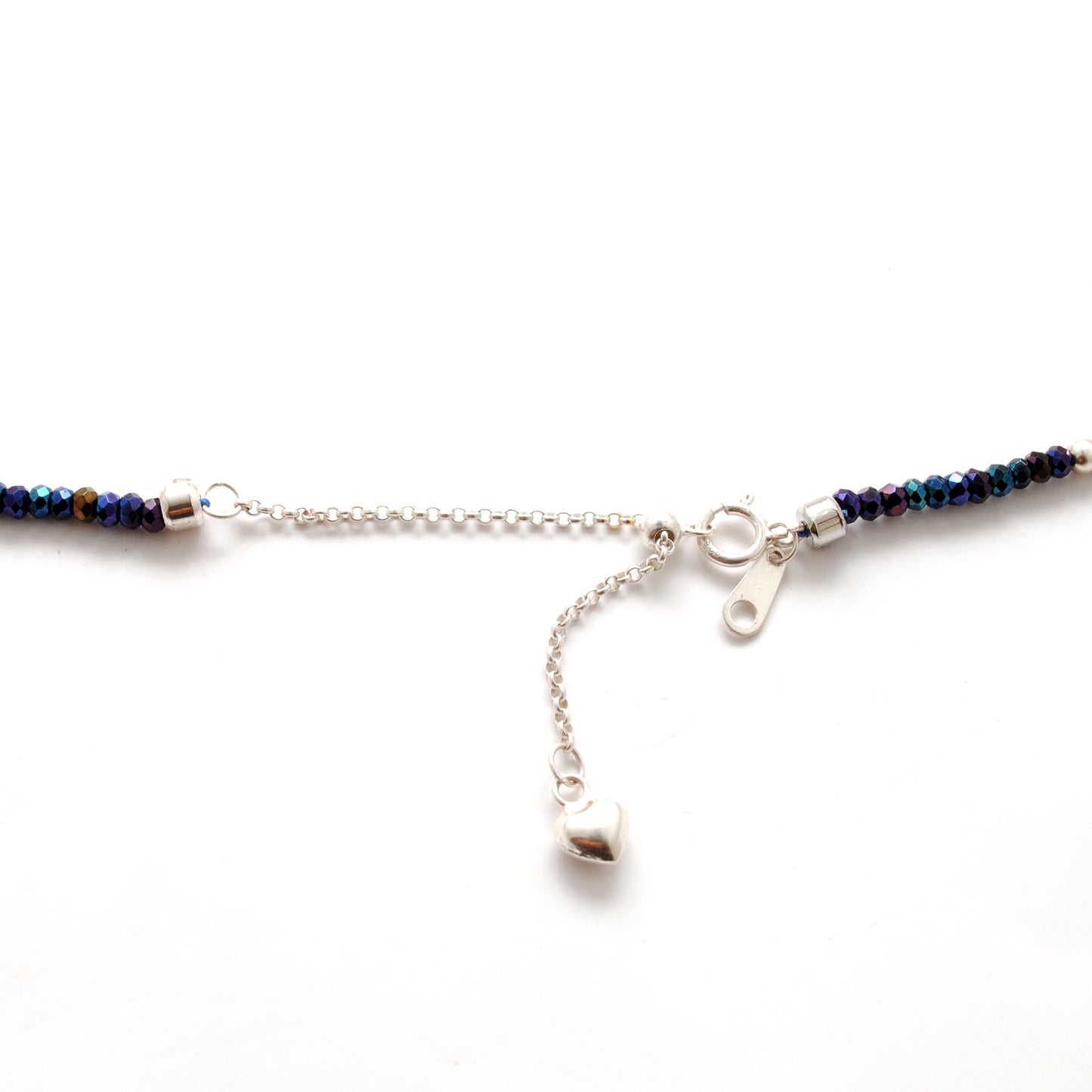 "Blue mystic coated faceted beaded necklace with silver clasp, iridescent shimmering gemstone jewelry, handcrafted design."
