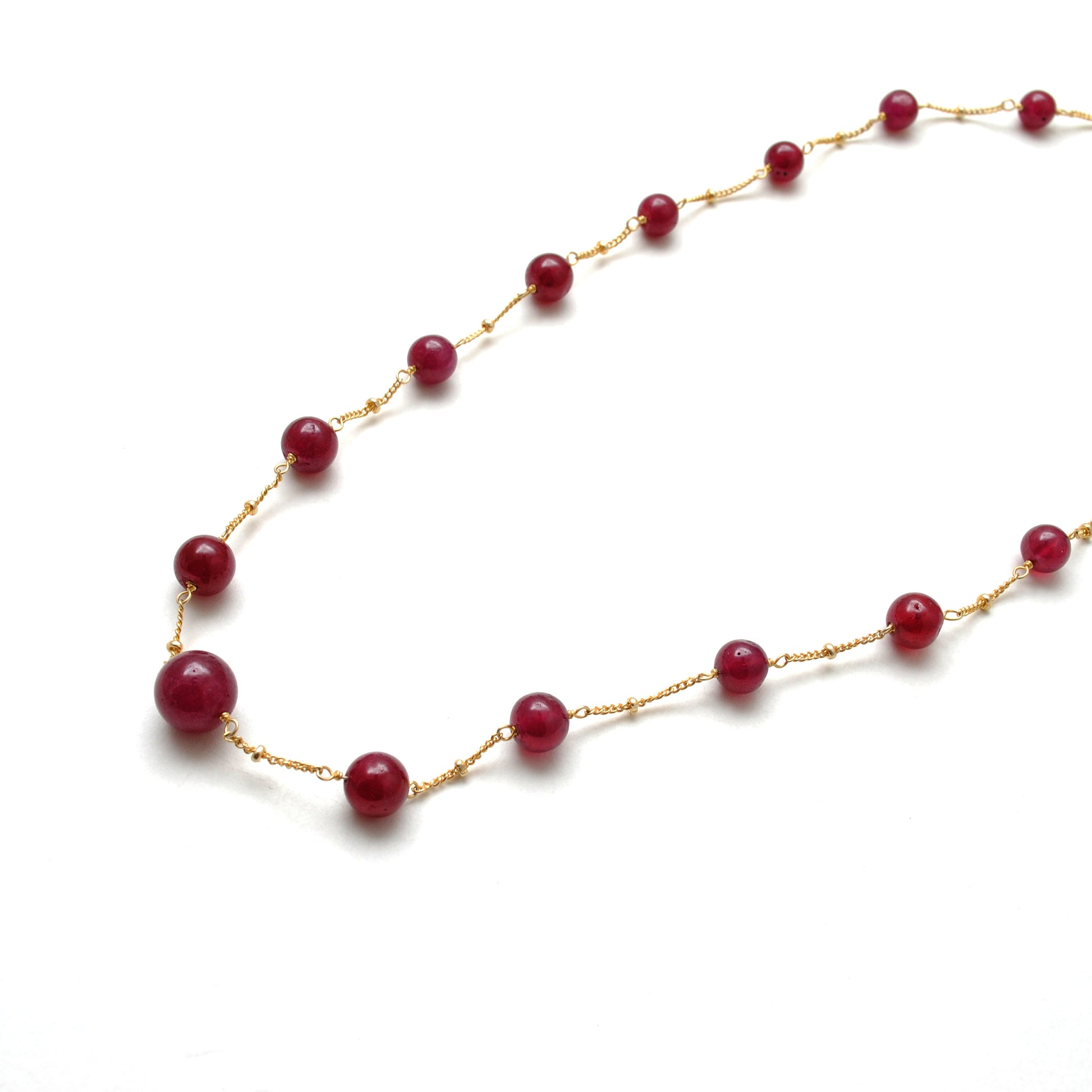 "Natural ruby ball bead necklace with sterling silver clasp, deep red gemstone jewelry, handcrafted elegant design."