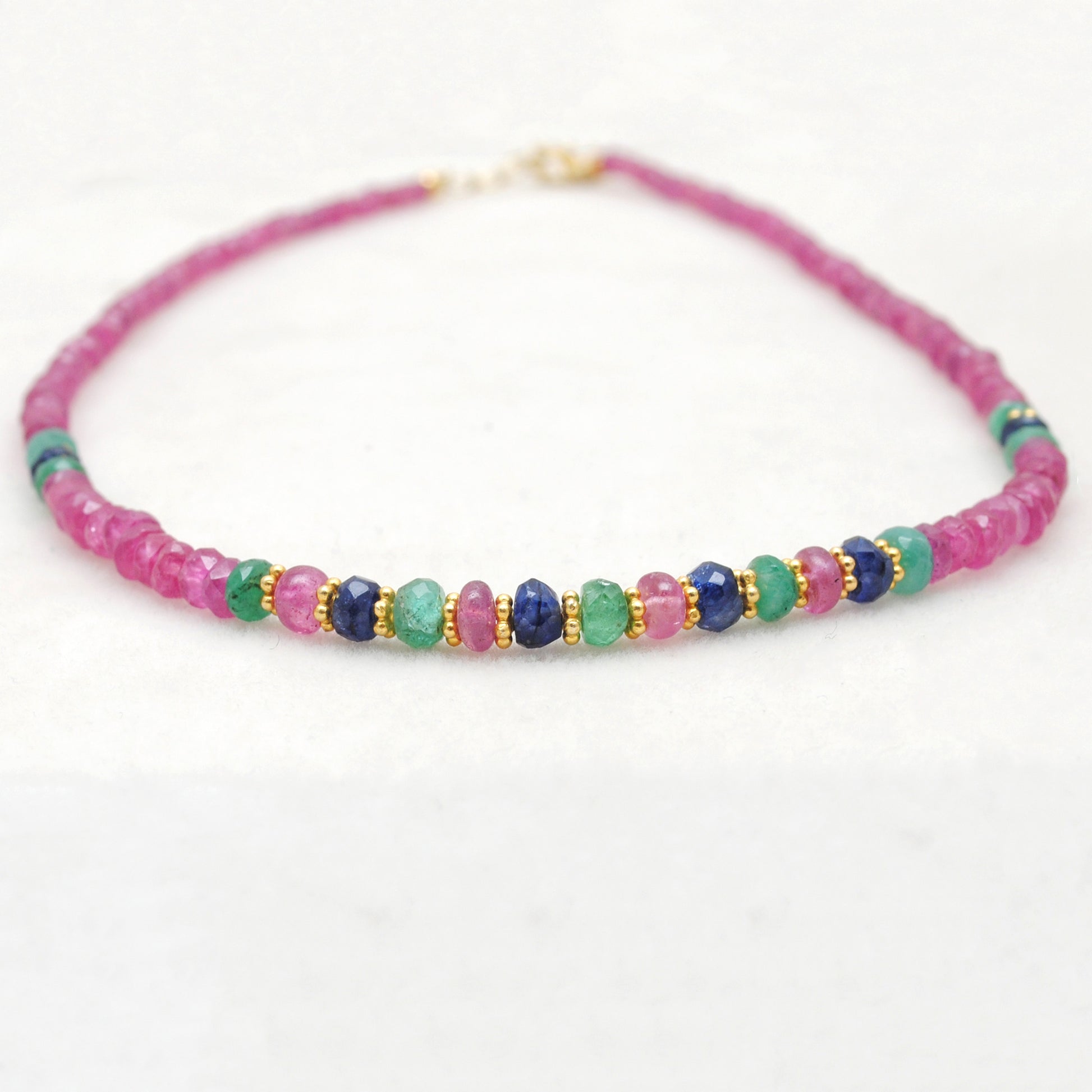 Ruby, emerald and sapphire beaded gold plated necklace with multicolor gemstones and elegant design