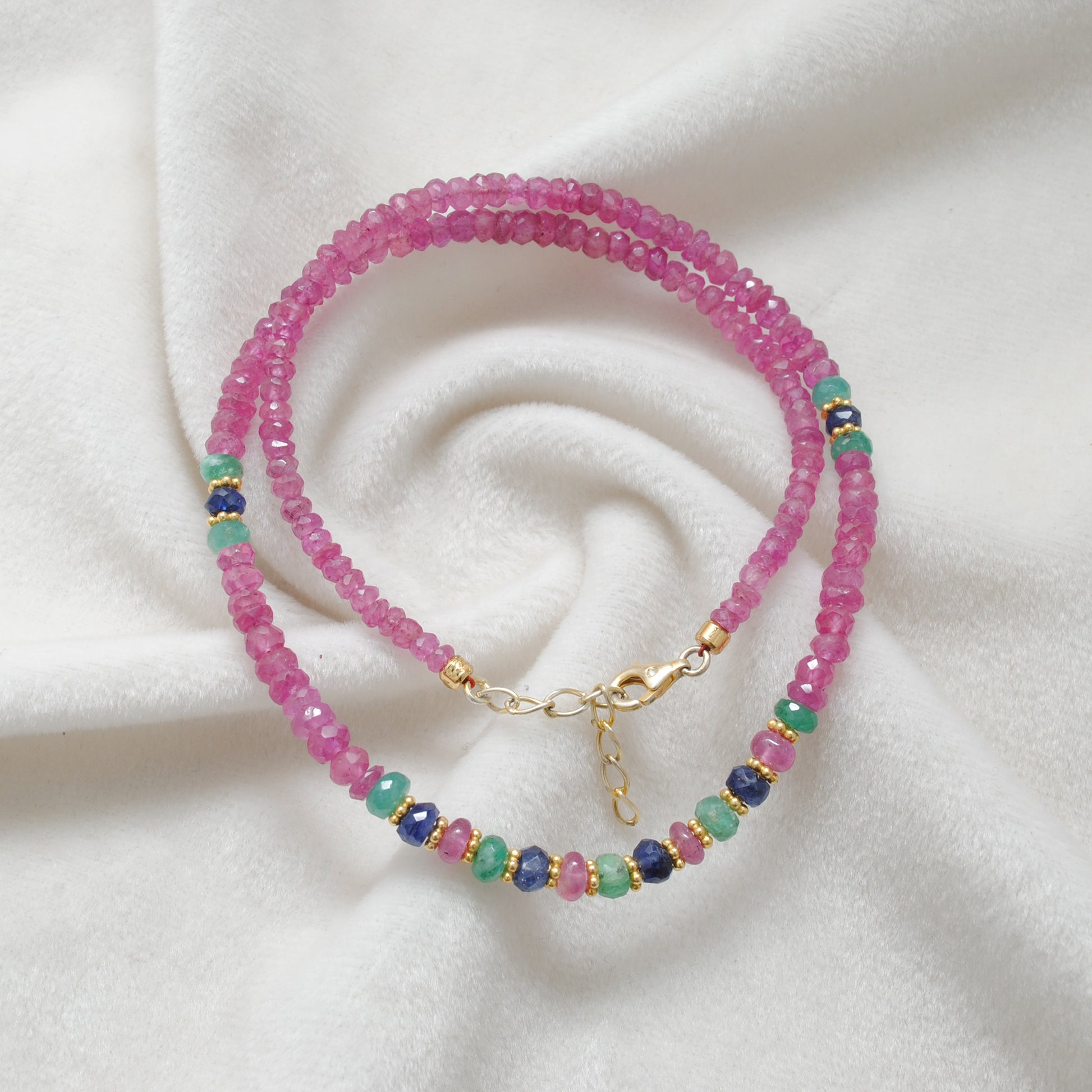 Ruby, emerald and sapphire beaded gold plated necklace with multicolor gemstones and elegant design