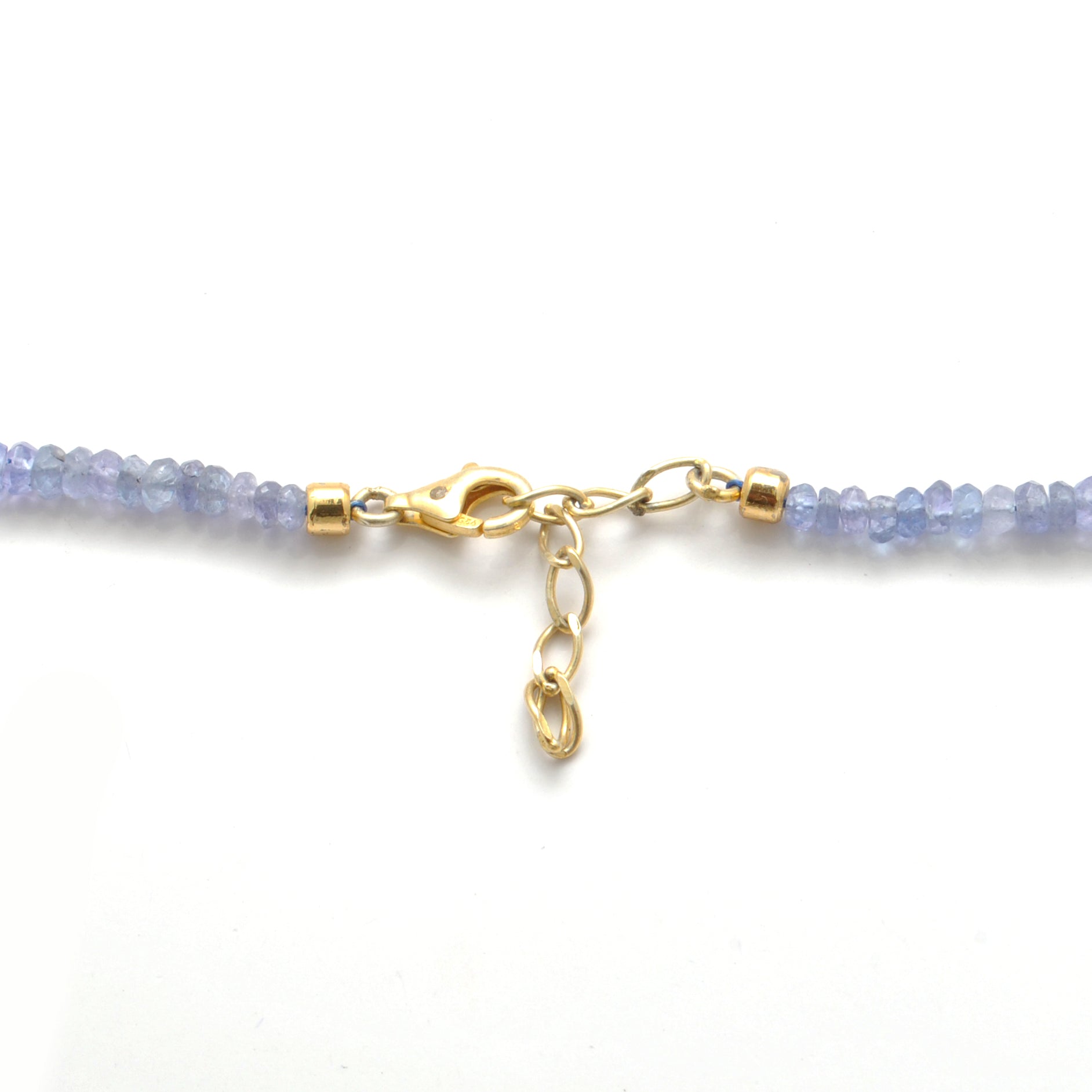 "Faceted tanzanite and Ethiopian opal beaded necklace with gold-plated finish, iridescent gemstone jewelry."