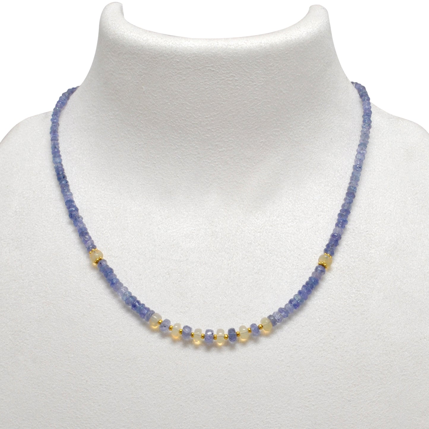 "Faceted tanzanite and Ethiopian opal beaded necklace with gold-plated finish, iridescent gemstone jewelry."