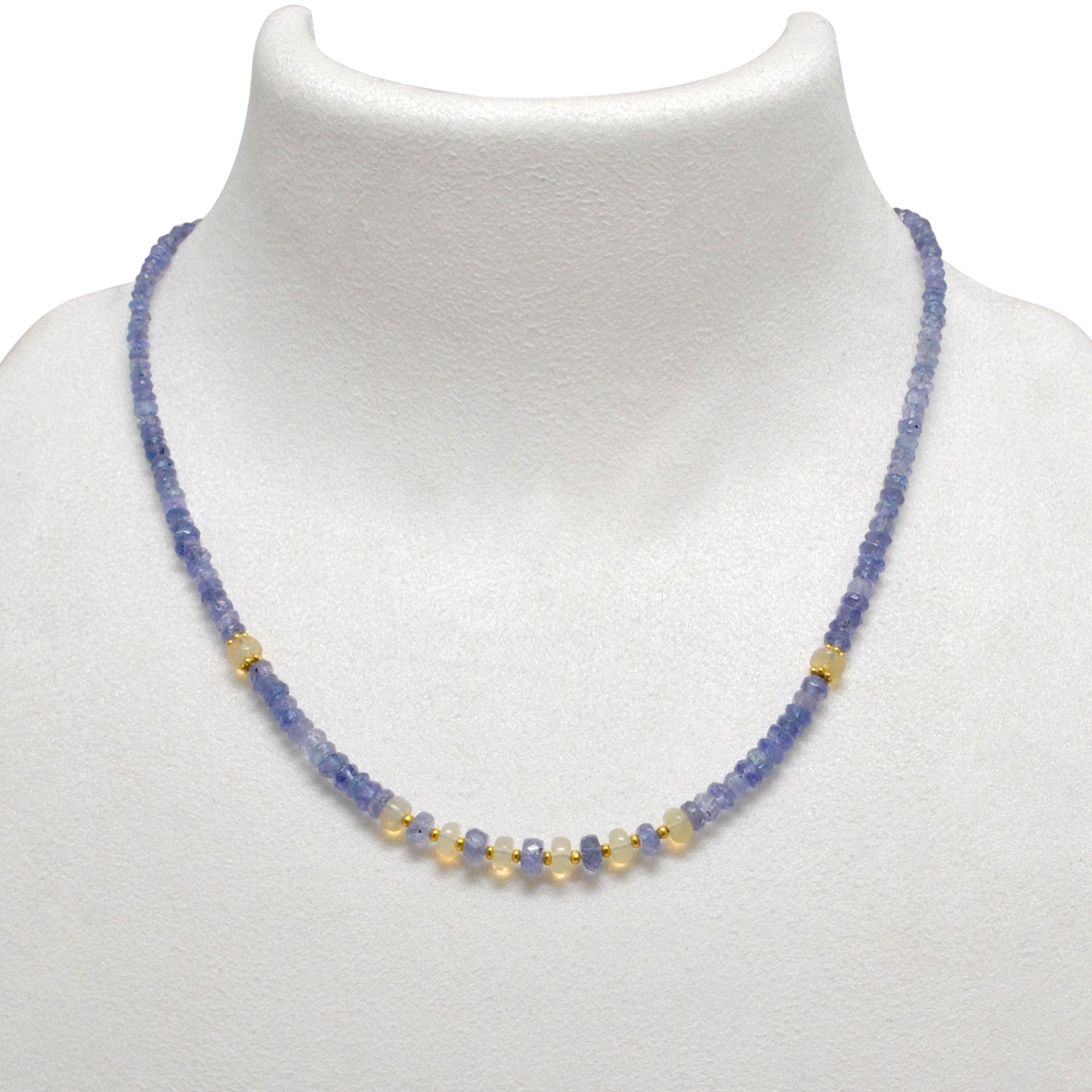 "Faceted tanzanite and Ethiopian opal beaded necklace with gold-plated finish, iridescent gemstone jewelry."