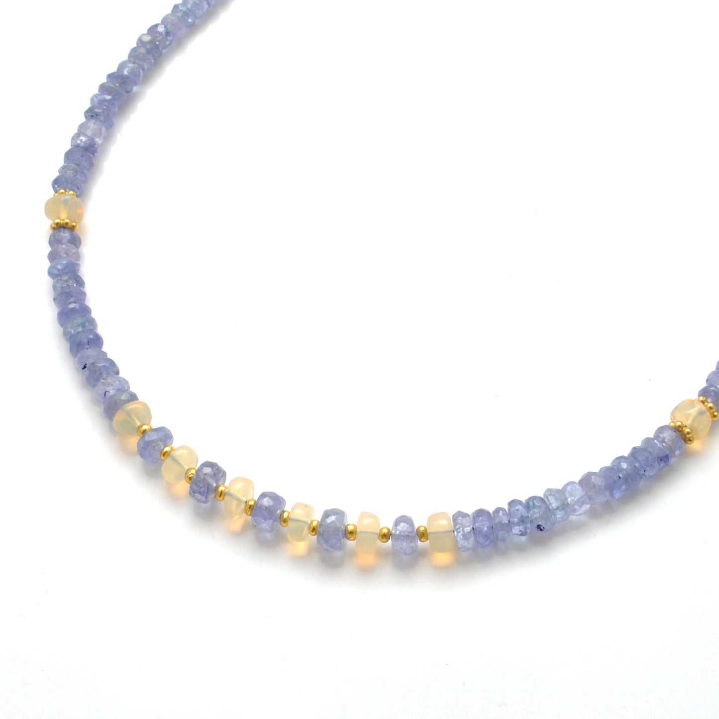 "Faceted tanzanite and Ethiopian opal beaded necklace with gold-plated finish, iridescent gemstone jewelry."