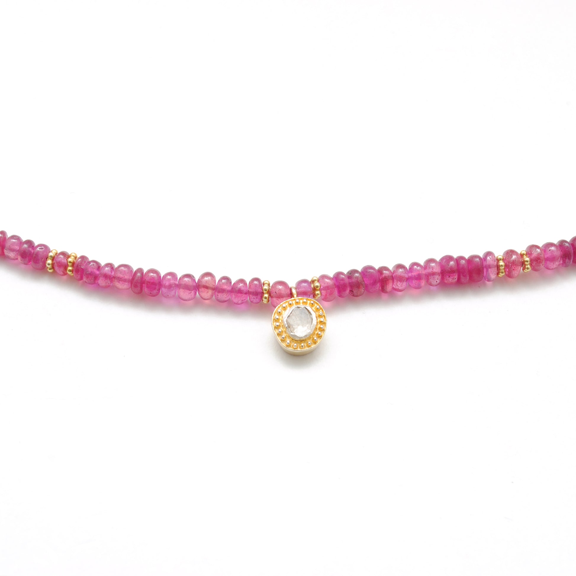 "Natural ruby beaded necklace with rose-cut diamond charm and sterling silver clasp, handcrafted jewelry with deep red gemstones for women."