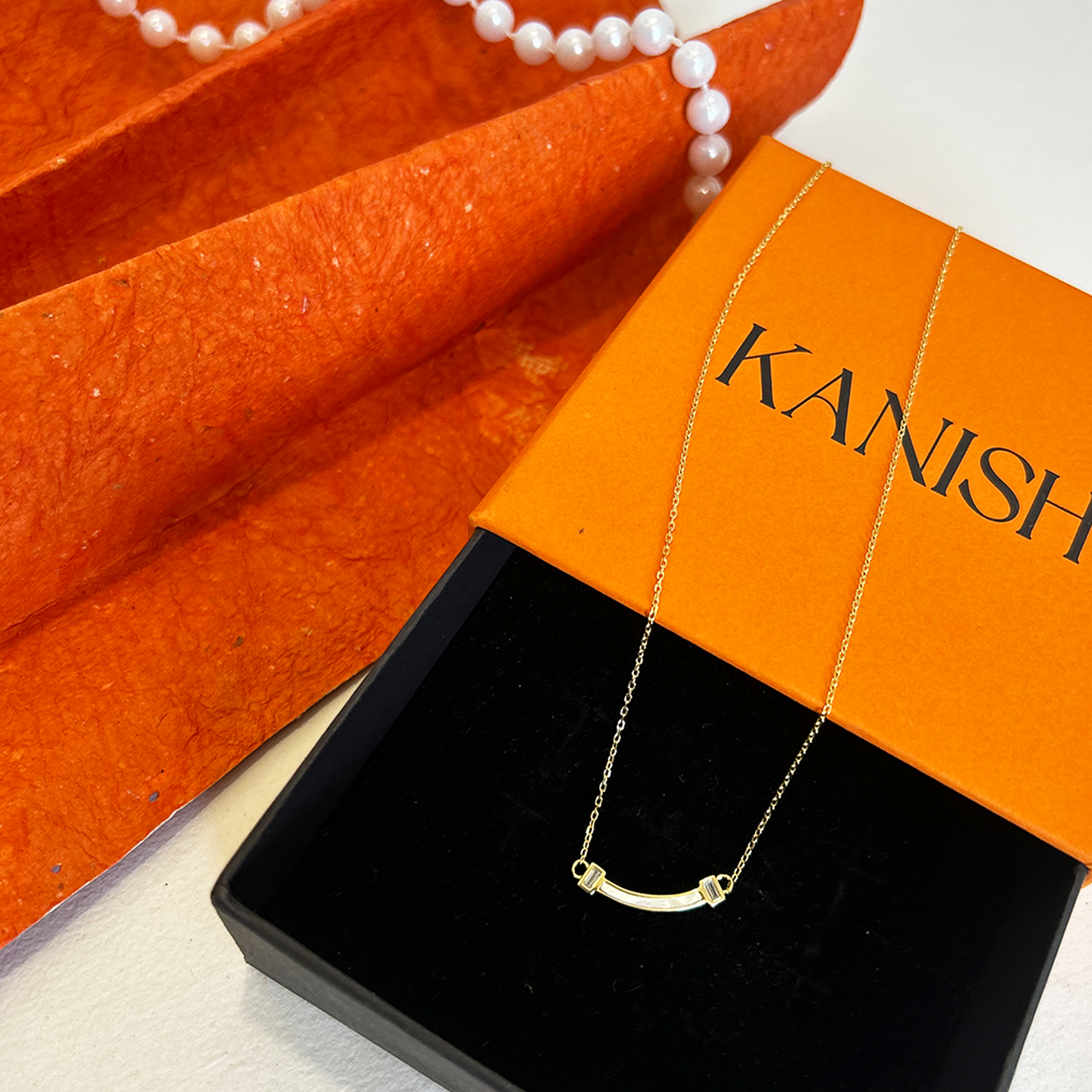 Gold Curved Bar Necklace with Crystal Accents